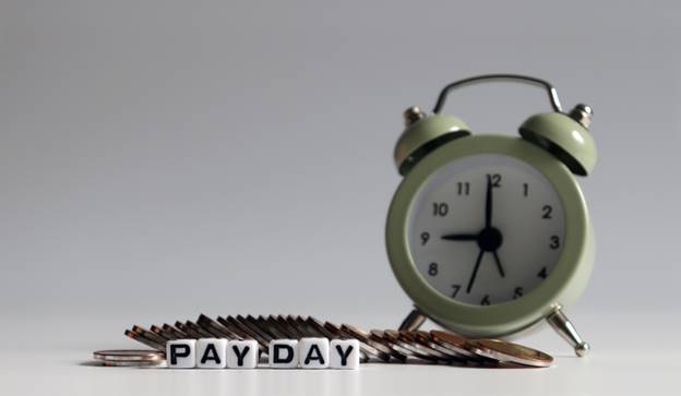 Payday next to clock - Wage Disputes